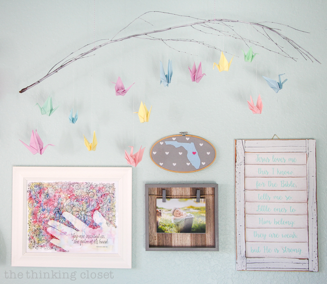 Juniper's "Little Adventurer" Nursery Tour | Here's a glimpse at our gallery wall, full of an eclectic mix of art, DIY projects, vintage treasures, and precious gifts from loved ones. So lovely!