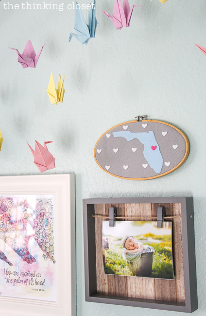 Juniper's "Little Adventurer" Nursery Tour | Here's a glimpse at our gallery wall, full of an eclectic mix of art, DIY projects, vintage treasures, and precious gifts from loved ones. So lovely!