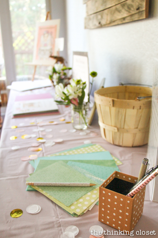 Time Capsule Station at a Blooming First Birthday Bash, inspired by spring flowers in pink, blush, and white. DIY party ideas for a woodland floral-themed celebration, spring fling, or botanical garden party!