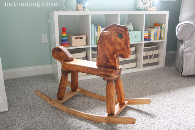 "Little Adventurer" Nursery Tour | An inspirational space with vintage-modern furniture, travel-themed decor, and a gender-neutral color palette of mint, gray, and white. This rocking horse is a family heirloom that was recently given a new lease on life! I feel like it completes the space. SWOON.