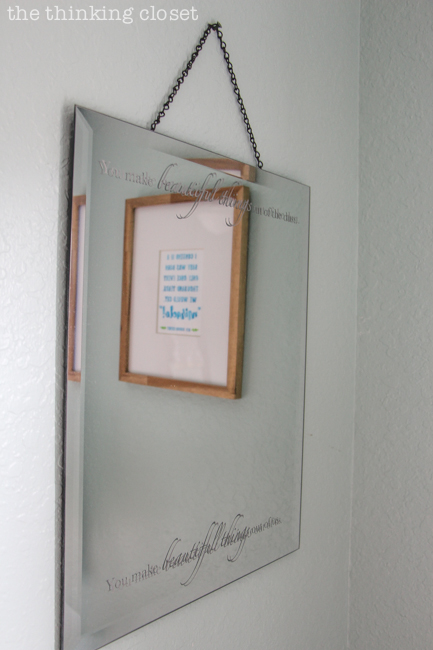 "Little Adventurer" Nursery Tour | An inspirational space with vintage-modern furniture, travel-themed decor, and a gender-neutral color palette of mint, gray, and white. With a little bit of creativity and a Silhouette machine, you can whip up custom art like this "You Make Beautiful Things Out of Dust" mirror and the watercolor nursery art!