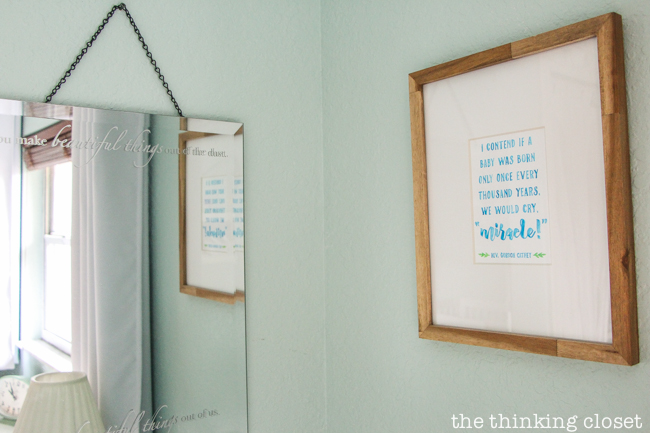"Little Adventurer" Nursery Tour | An inspirational space with vintage-modern furniture, travel-themed decor, and a gender-neutral color palette of mint, gray, and white. With a little bit of creativity and a Silhouette machine, you can whip up custom art like this "You Make Beautiful Things Out of Dust" mirror and the watercolor nursery art!