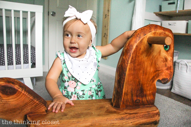 "Little Adventurer" Nursery Tour | An inspirational space with vintage-modern furniture, travel-themed decor, and a gender-neutral color palette of mint, gray, and white. This rocking horse is a family heirloom that was recently given a new lease on life! I feel like it completes the space. SWOON.