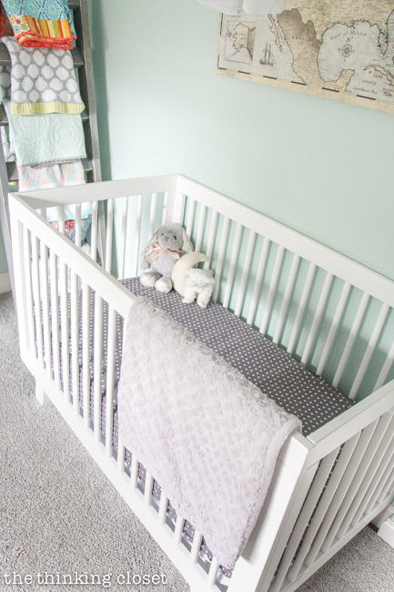 "Little Adventurer" Nursery Tour | An inspirational space with vintage-modern furniture, travel-themed decor, and a gender-neutral color palette of mint, gray, and white. Here's the Hudson convertible crib by Babyletto, bringing in the mid-century modern vibe! 