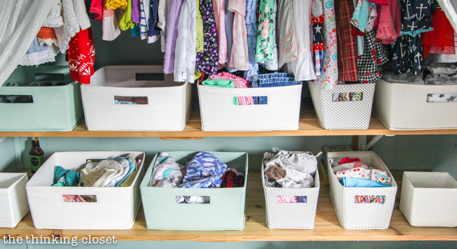 "Little Adventurer" Nursery Tour | An inspirational space with vintage-modern furniture, travel-themed decor, and a gender-neutral color palette of mint, gray, and white. This open shelving closet makes the type A organizer in me swoon! Just remove the closet doors, install a few shelves, and start filling it up with totes and baskets. Pretty AND functional. I can dig it!