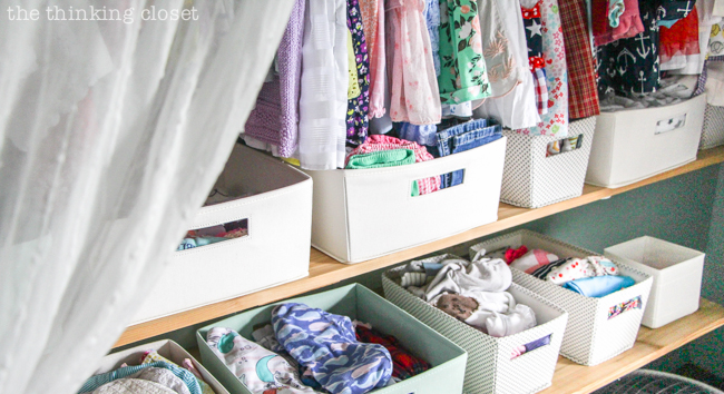 "Little Adventurer" Nursery Tour | An inspirational space with vintage-modern furniture, travel-themed decor, and a gender-neutral color palette of mint, gray, and white. This open shelving closet makes the type A organizer in me swoon! Just remove the closet doors, install a few shelves, and start filling it up with totes and baskets. Pretty AND functional. I can dig it!