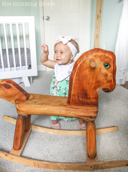 "Little Adventurer" Nursery Tour | An inspirational space with vintage-modern furniture, travel-themed decor, and a gender-neutral color palette of mint, gray, and white. This rocking horse is a family heirloom that was recently given a new lease on life! I feel like it completes the space. SWOON.