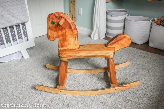 "Little Adventurer" Nursery Tour | An inspirational space with vintage-modern furniture, travel-themed decor, and a gender-neutral color palette of mint, gray, and white. This rocking horse is a family heirloom that was recently given a new lease on life! I feel like it completes the space. SWOON.