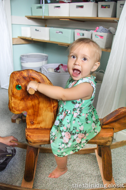 "Little Adventurer" Nursery Tour | An inspirational space with vintage-modern furniture, travel-themed decor, and a gender-neutral color palette of mint, gray, and white. This rocking horse is a family heirloom that was recently given a new lease on life! I feel like it completes the space. SWOON.