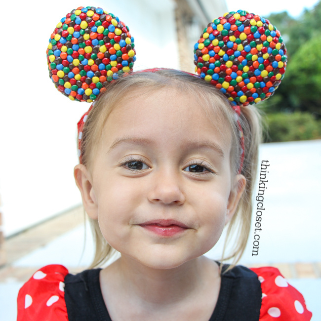 "Minnie M & M" Punny Halloween Costume Idea for a little girl, toddler, or baby...plus Disney-themed punny Halloween costumes for the parents! Check out the full post for the whole knee-slapping run-down!