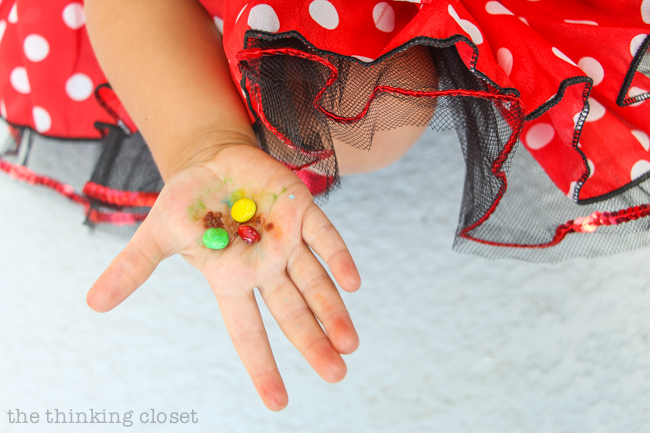 "Minnie M & M" Punny Halloween Costume Idea for a little girl, toddler, or baby...plus Disney-themed punny Halloween costumes for the parents! Check out the full post for the whole knee-slapping run-down!