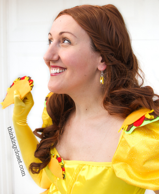 "Taco Belle" Punny Halloween Costume...just one of three clever Disney-themed Punny Halloween Costume ideas for the pun-loving family of three! Check out the post for the full DIY run-down on this creative costume and sneak a peek at Prince Charm-ing and Minnie M&M!