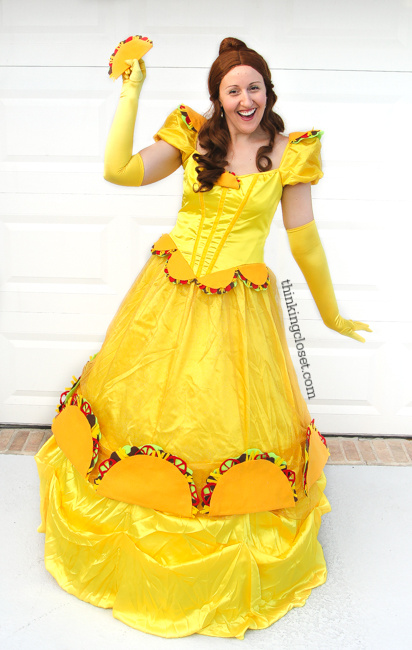 "Taco Belle" Punny Halloween Costume...just one of three clever Disney-themed Punny Halloween Costume ideas for the pun-loving family of three! Check out the post for the full DIY run-down on this creative costume and sneak a peek at Prince Charm-ing and Minnie M&M!