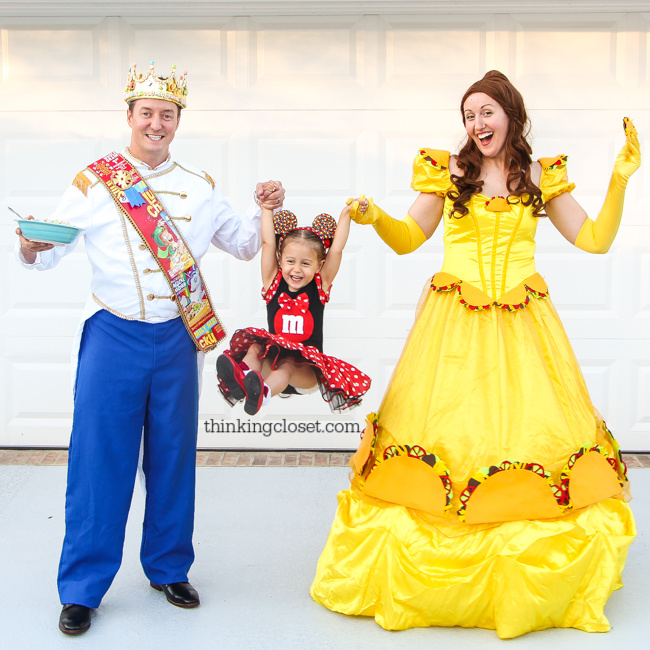 Disney-Themed Punny Halloween Costume for a Family of 3! Introducing "Prince Charm-ing," "Taco Belle," and their "Minnie M & M." Here's the inside scoop for how we pulled together our seventh annual creative punny Halloween costumes...including step by step tutorials for the do-able DIY elements. Also, check out our punny Halloween costumes from the past 6 years! So many knee-slapping costume ideas in this mix.