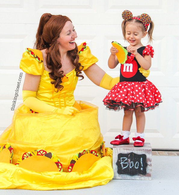 Disney-Themed Punny Halloween Costume for a Family of 3! Introducing "Prince Charm-ing," "Taco Belle," and their "Minnie M & M." Here's the inside scoop for how we pulled together our seventh annual creative punny Halloween costumes...including step by step tutorials for the do-able DIY elements. Also, check out our punny Halloween costumes from the past 6 years! So many knee-slapping costume ideas in this mix.