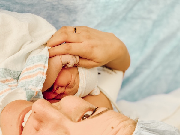Holding hands for the first time! | Pepper's Birth Story via ThinkingCloset.com