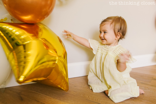 Vintage yellow dress for our shining star of a birthday girl! | A "Twinkle Twinkle Little Star" 1st Birthday Party, inspired by our favorite baby lullaby. DIY party ideas for a dazzling celebration for your shining star's first birthday or baby shower!