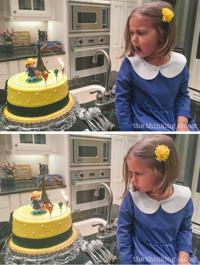 A few of the candles were being extra stubborn when Junie was trying to blow them out...she gave them the stink eye! | How to host a "Madeline In Paris"-themed 4th birthday party at home with creative DIY party activities, French decor, and costumes inspired by the classic Madeline children's books via ThinkingCloset.com