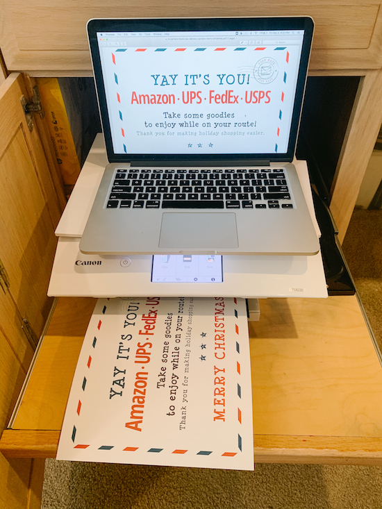Printing out the sign for our Delivery Drivers Holiday Treats Station | Video & photo tutorial for how to set up a Holiday Treats Station on your porch with snacks & drinks for your neighborhood delivery drivers & U.S.P.S. workers. A simple way to make someone's day & show gratitude to our essential workers this Christmas season!