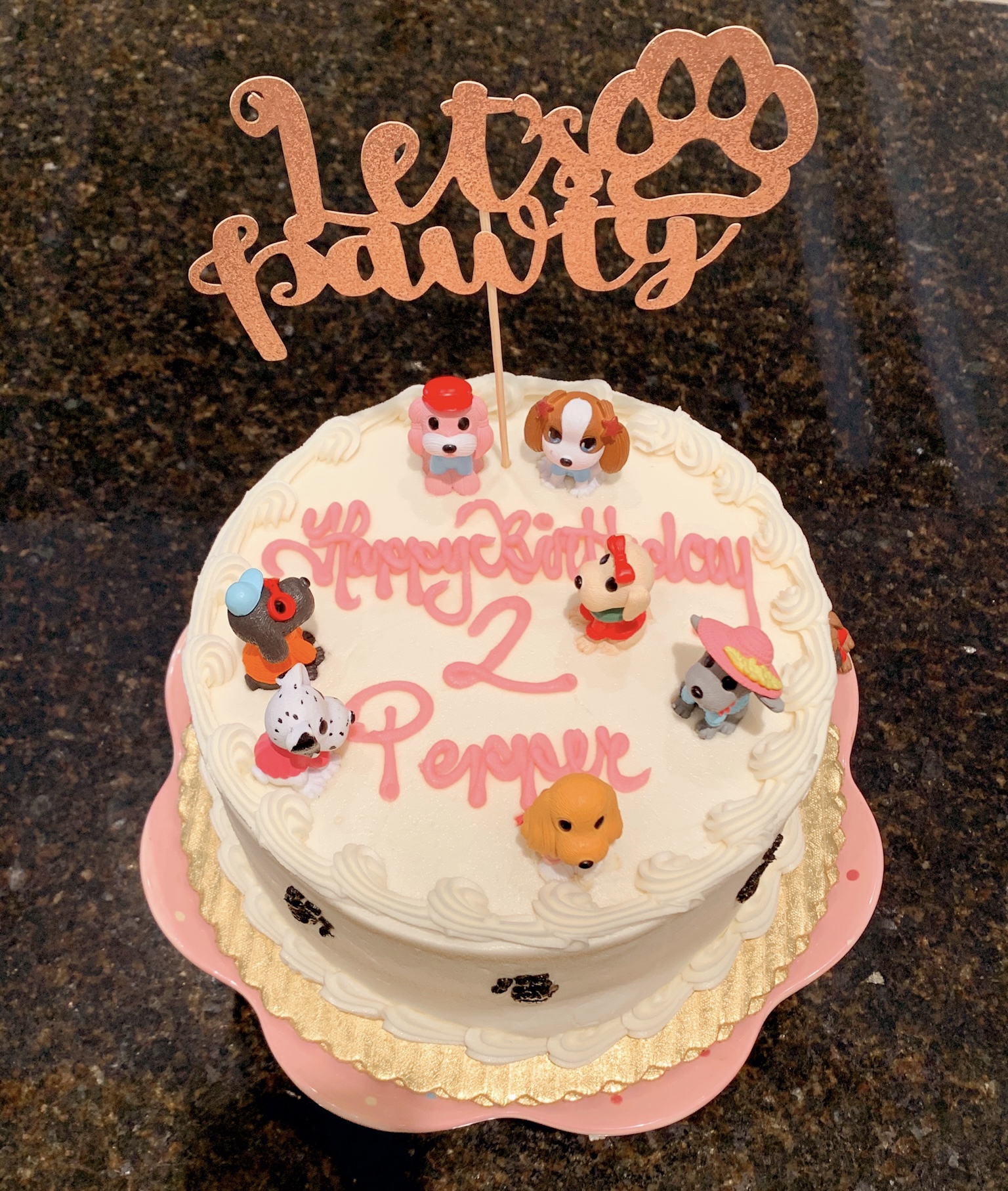Pepper's 2nd Birthday "Puppy Paw-ty!" Creative party ideas via thinkingcloset.com - How to host a puppy-themed pawty with an adopt a puppy activity fun for all ages! And of course, we had a cake decorated to fit the puppy theme!