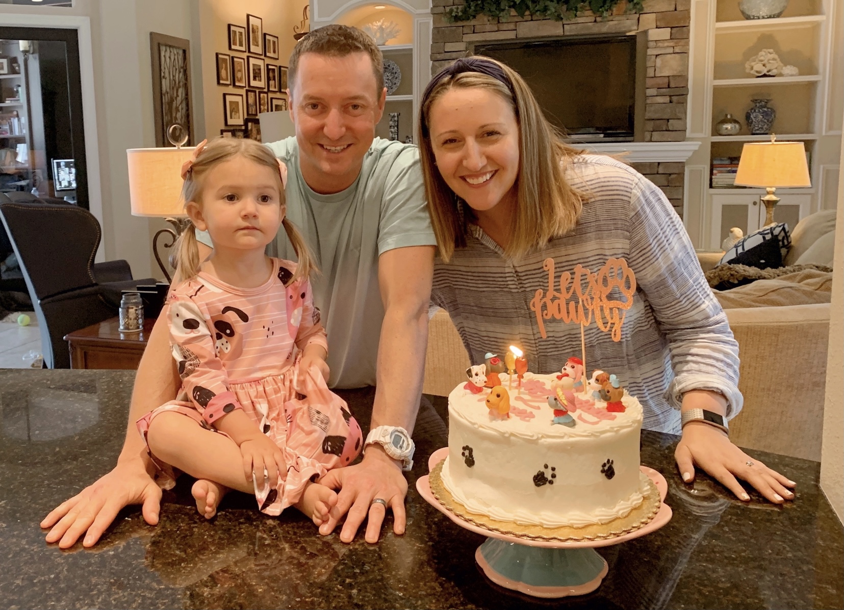 Pepper's 2nd Birthday "Puppy Paw-ty!" Creative party ideas via thinkingcloset.com - How to host a puppy-themed pawty with an adopt a puppy activity fun for all ages! And of course, we had a cake decorated to fit the puppy theme!