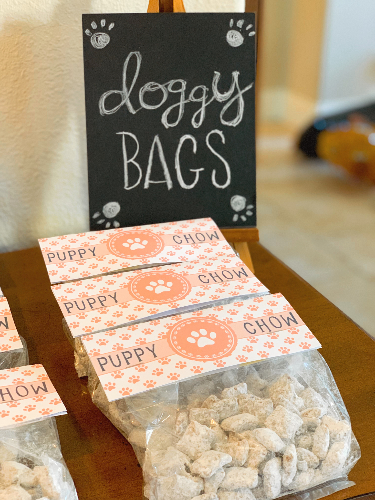 Pepper's 2nd Birthday "Puppy Paw-ty!" Creative party ideas via thinkingcloset.com - How to host a puppy-themed pawty with an adopt a puppy activity fun for all ages! We gave puppy chow doggy bags as our party favor!