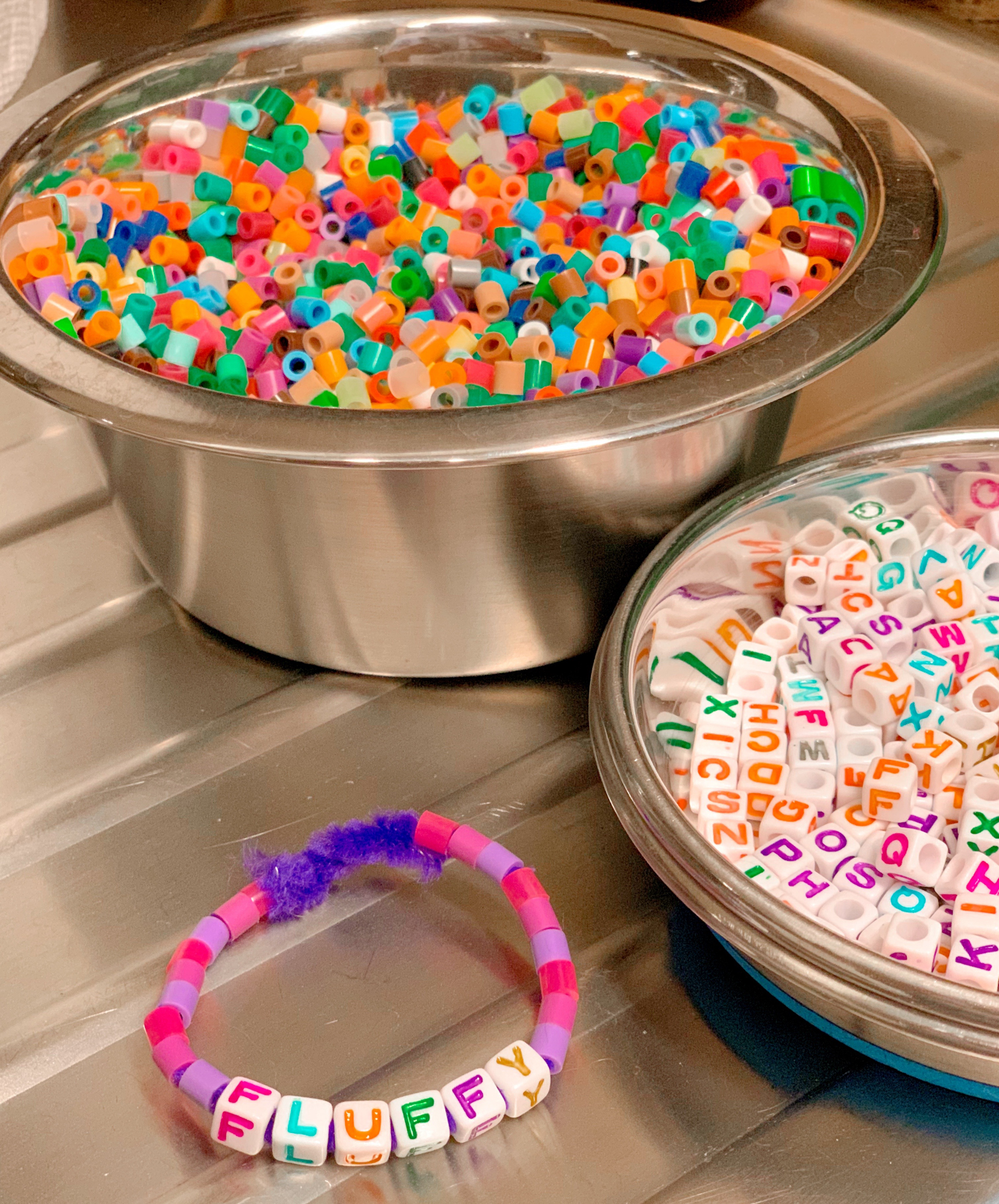 Pepper's 2nd Birthday "Puppy Paw-ty!" Creative party ideas via thinkingcloset.com - How to host a puppy-themed pawty with an adopt a puppy activity fun for all ages! The second station was where they made a collar!