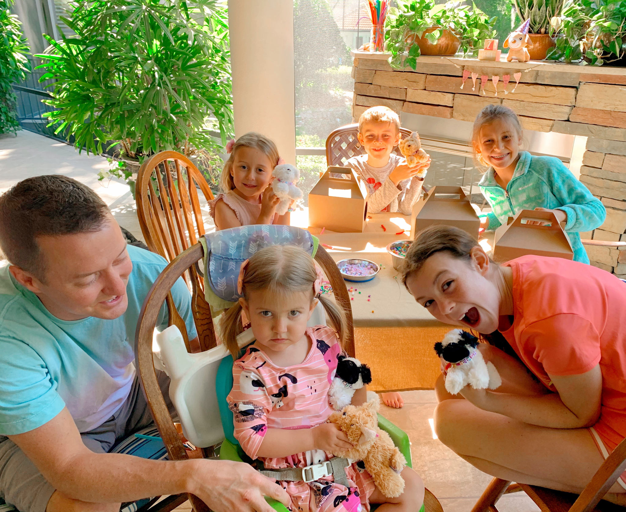 Pepper's 2nd Birthday "Puppy Paw-ty!" Creative party ideas via thinkingcloset.com - How to host a puppy-themed pawty with an adopt a puppy activity fun for all ages! The second station was where they made a collar!