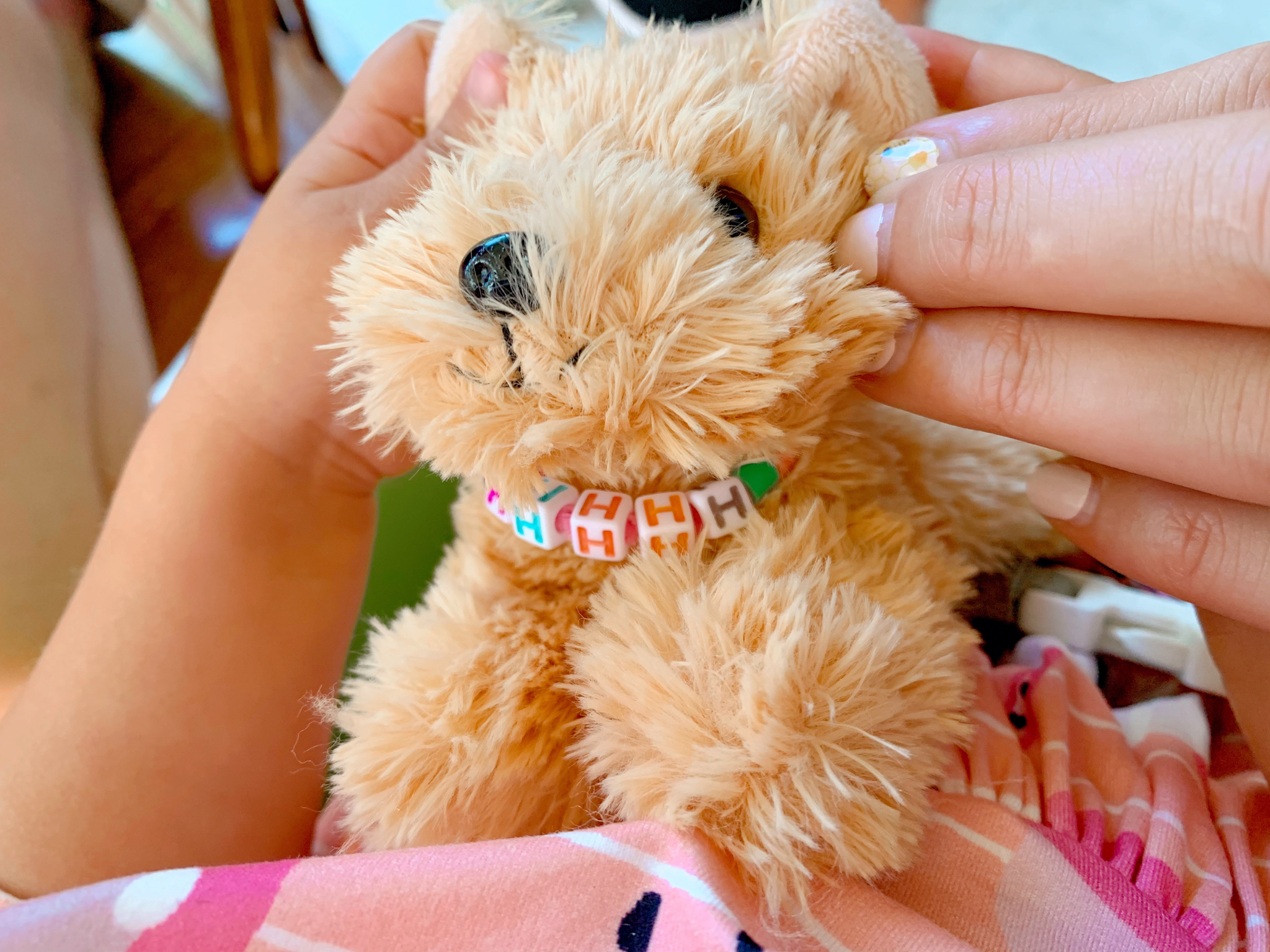 Pepper's 2nd Birthday "Puppy Paw-ty!" Creative party ideas via thinkingcloset.com - How to host a puppy-themed pawty with an adopt a puppy activity fun for all ages! The second station was where they made a collar!