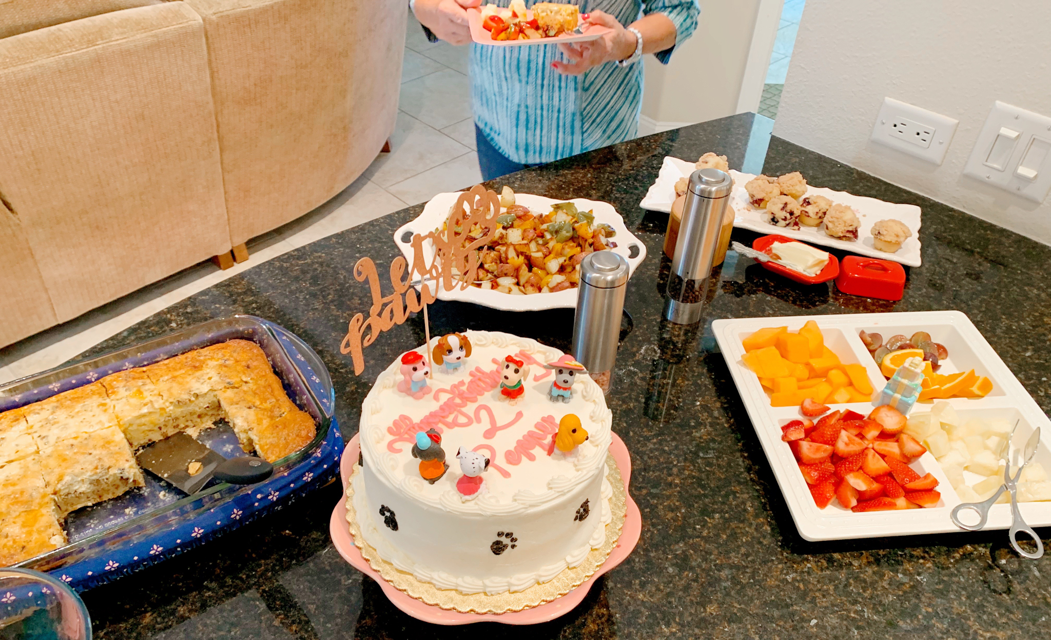 Pepper's 2nd Birthday "Puppy Paw-ty!" Creative party ideas via thinkingcloset.com - How to host a puppy-themed pawty with an adopt a puppy activity fun for all ages and chow time that's on theme!