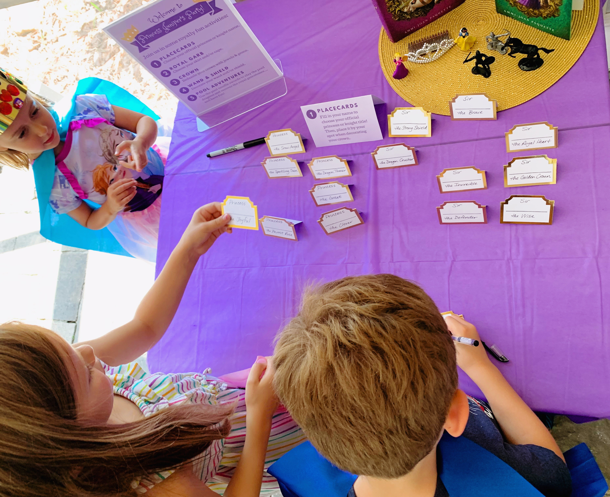 Juniper's "Princesses & Knights" 5th Birthday Pool Party & Royal Golden Birthday Celebration | Creative ideas including a punny invitation, DIY castle backdrop, a golden birthday banner, creative activities for kids of all ages & party favors galore! via thinkingcloset.com