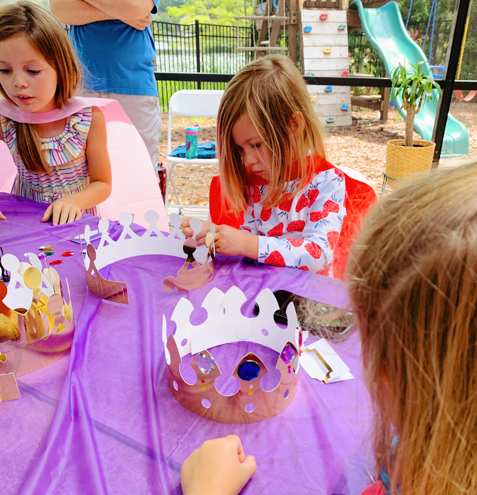 Juniper's "Princesses & Knights" 5th Birthday Pool Party & Royal Golden Birthday Celebration | Creative ideas including a punny invitation, DIY castle backdrop, a golden birthday banner, creative activities for kids of all ages & party favors galore! via thinkingcloset.com