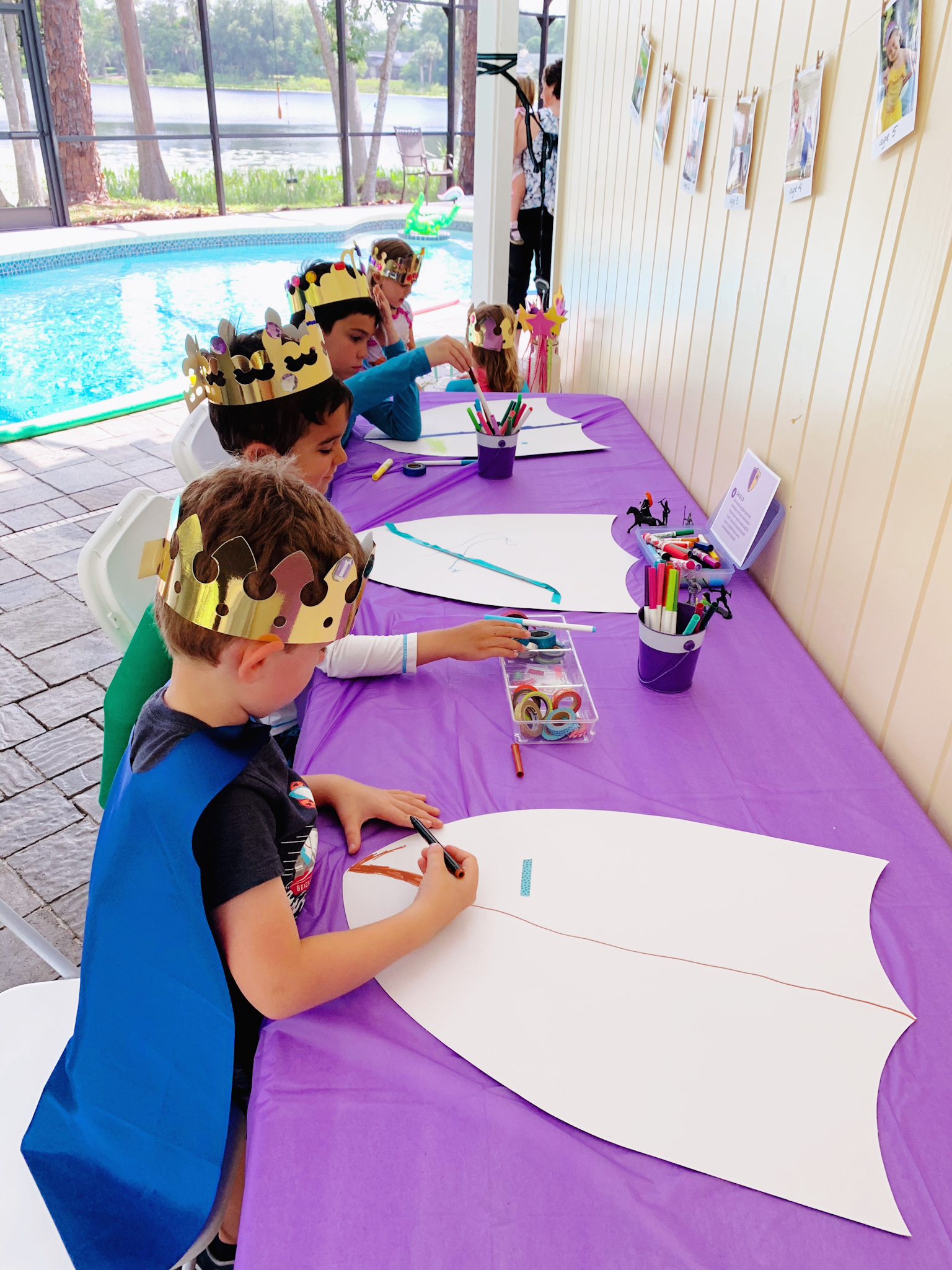 Juniper's "Princesses & Knights" 5th Birthday Pool Party & Royal Golden Birthday Celebration | Creative ideas including a punny invitation, DIY castle backdrop, a golden birthday banner, creative activities for kids of all ages & party favors galore! via thinkingcloset.com