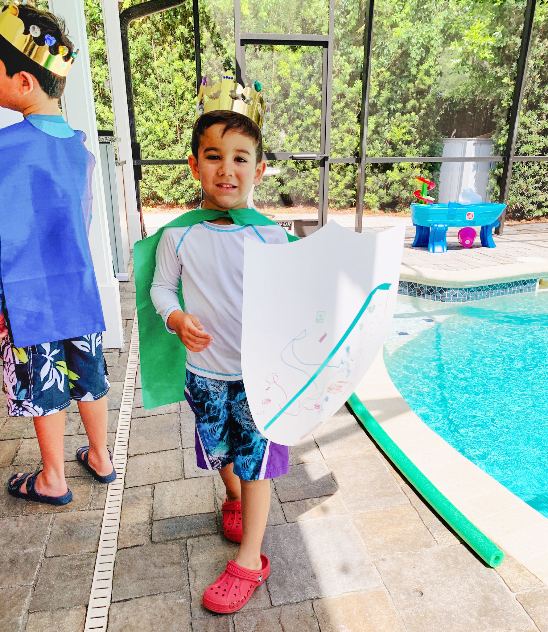 Juniper's "Princesses & Knights" 5th Birthday Pool Party & Royal Golden Birthday Celebration | Creative ideas including a punny invitation, DIY castle backdrop, a golden birthday banner, creative activities for kids of all ages & party favors galore! via thinkingcloset.com