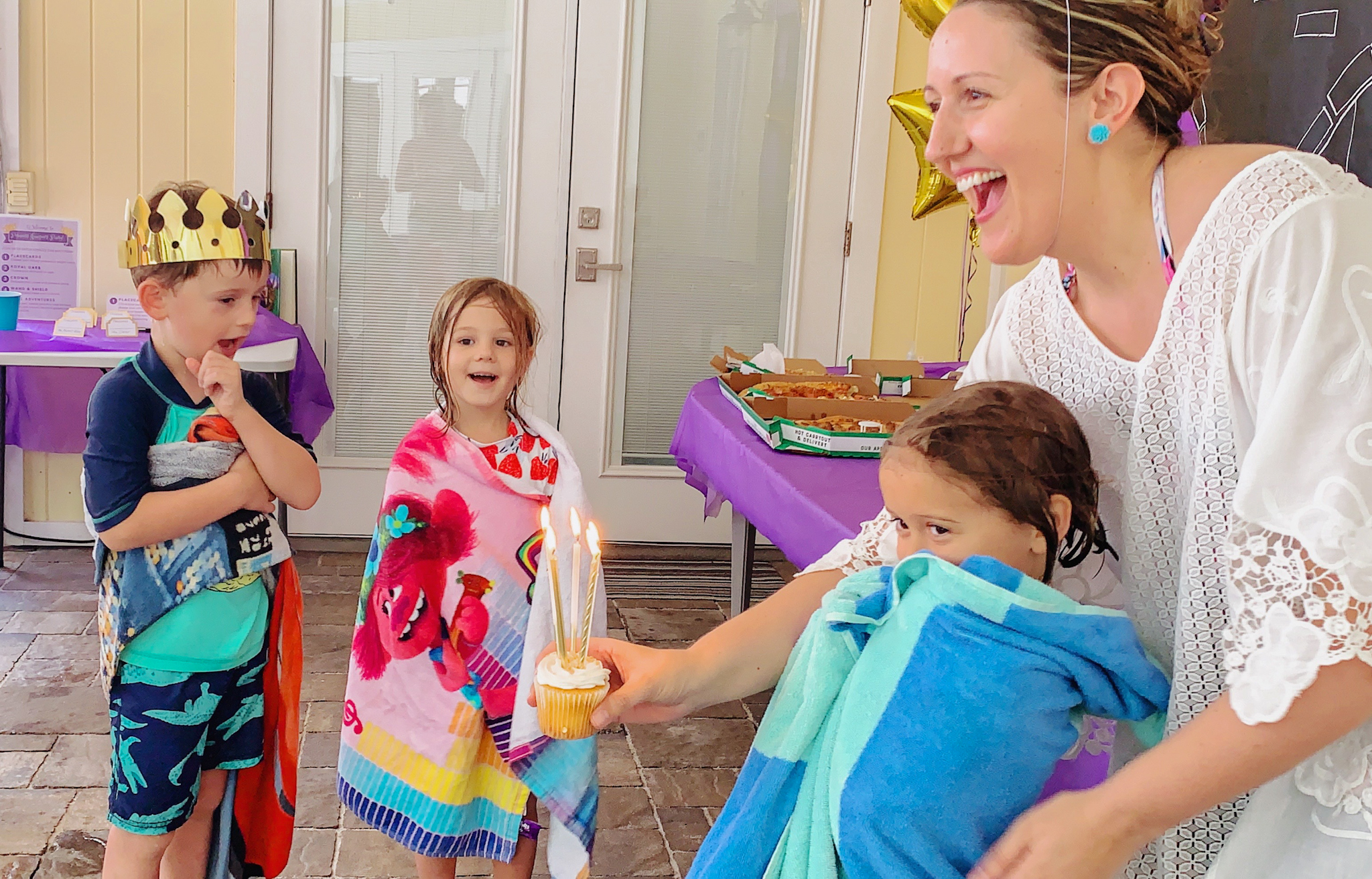 Juniper's "Princesses & Knights" 5th Birthday Pool Party & Royal Golden Birthday Celebration | Creative ideas including a punny invitation, DIY castle backdrop, a golden birthday banner, creative activities for kids of all ages & party favors galore! via thinkingcloset.com