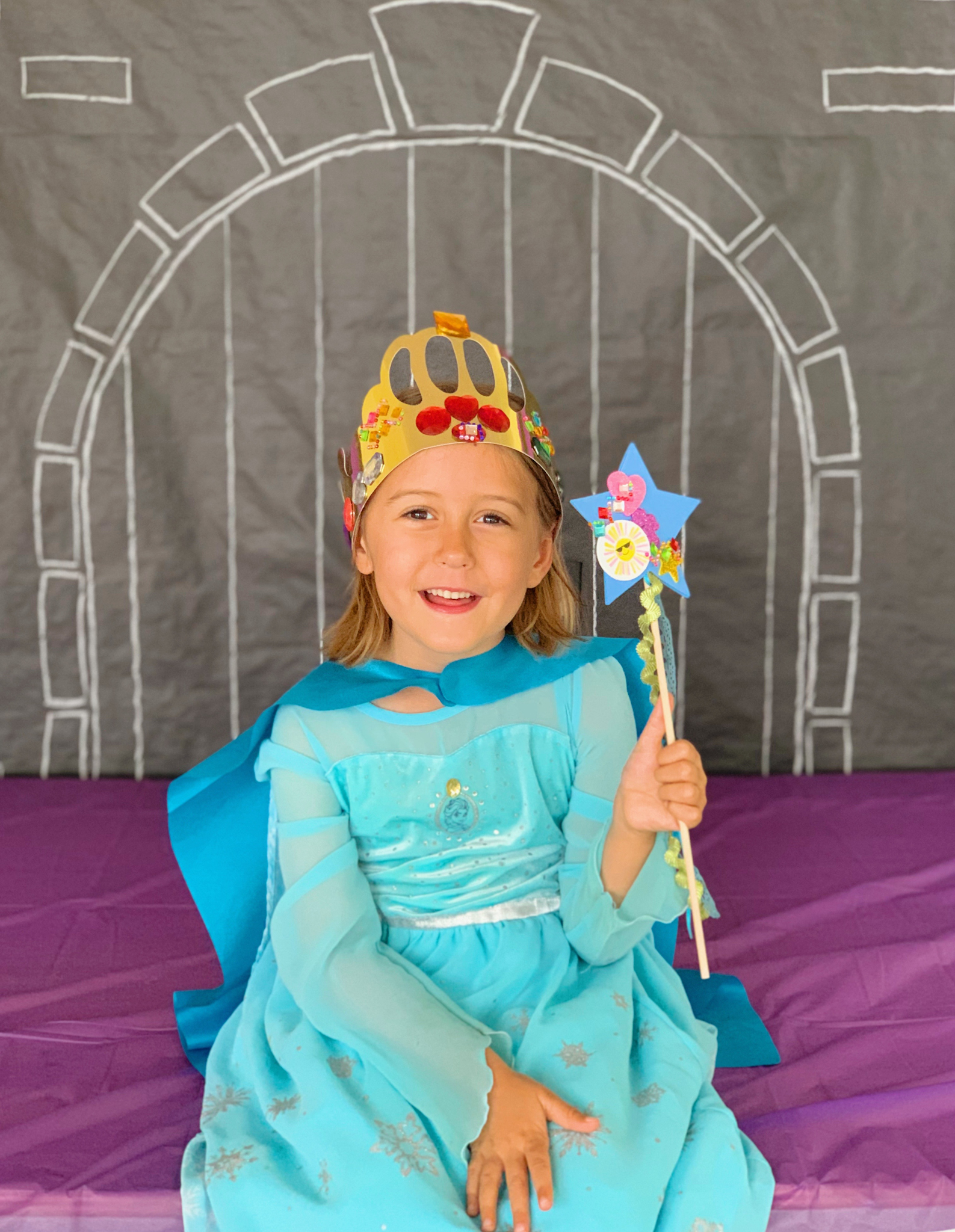 Juniper's "Princesses & Knights" 5th Birthday Pool Party & Royal Golden Birthday Celebration | Creative ideas including a punny invitation, DIY castle backdrop, a golden birthday banner, creative activities for kids of all ages & party favors galore! via thinkingcloset.com
