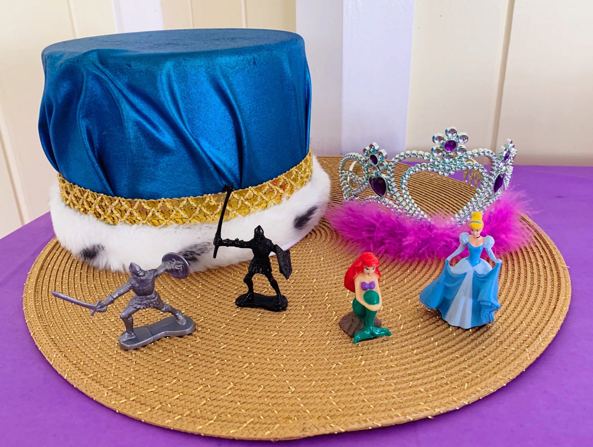 Juniper's "Princesses & Knights" 5th Birthday Pool Party & Royal Golden Birthday Celebration | Creative ideas including a punny invitation, DIY castle backdrop, a golden birthday banner, creative activities for kids of all ages & party favors galore! via thinkingcloset.com
