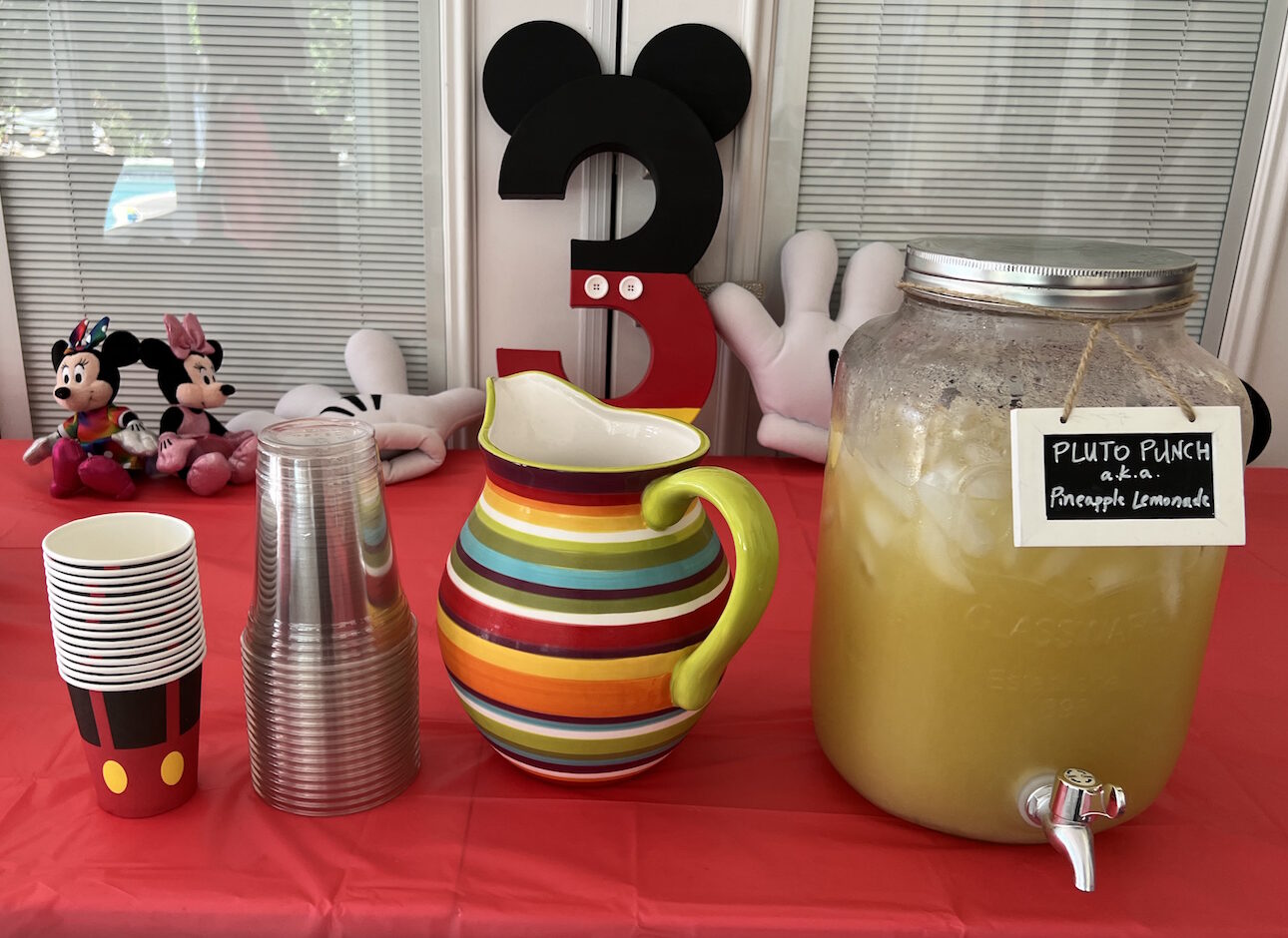Pluto Punch at Pepper's Magical "Mickey & Minnie Mouse" 3rd Birthday Pool Party | Creative ideas for hosting a magical Mickey & Minnie themed birthday bash for your little Mouseketeer with do-able decor, punny snacks, and party games that are fun for all ages! via thinkingcloset.com