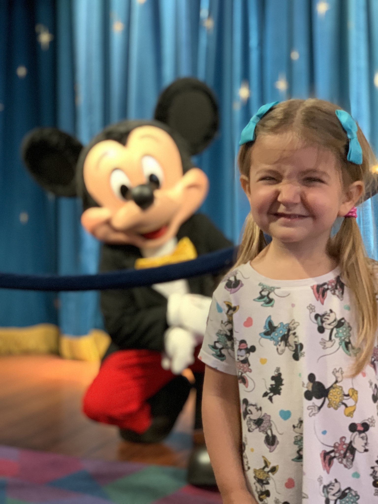 Pepper meets Mickey at Epcot! Part of why we chose the Mickey and Minnie Mouse theme for her 3rd birthday party!
