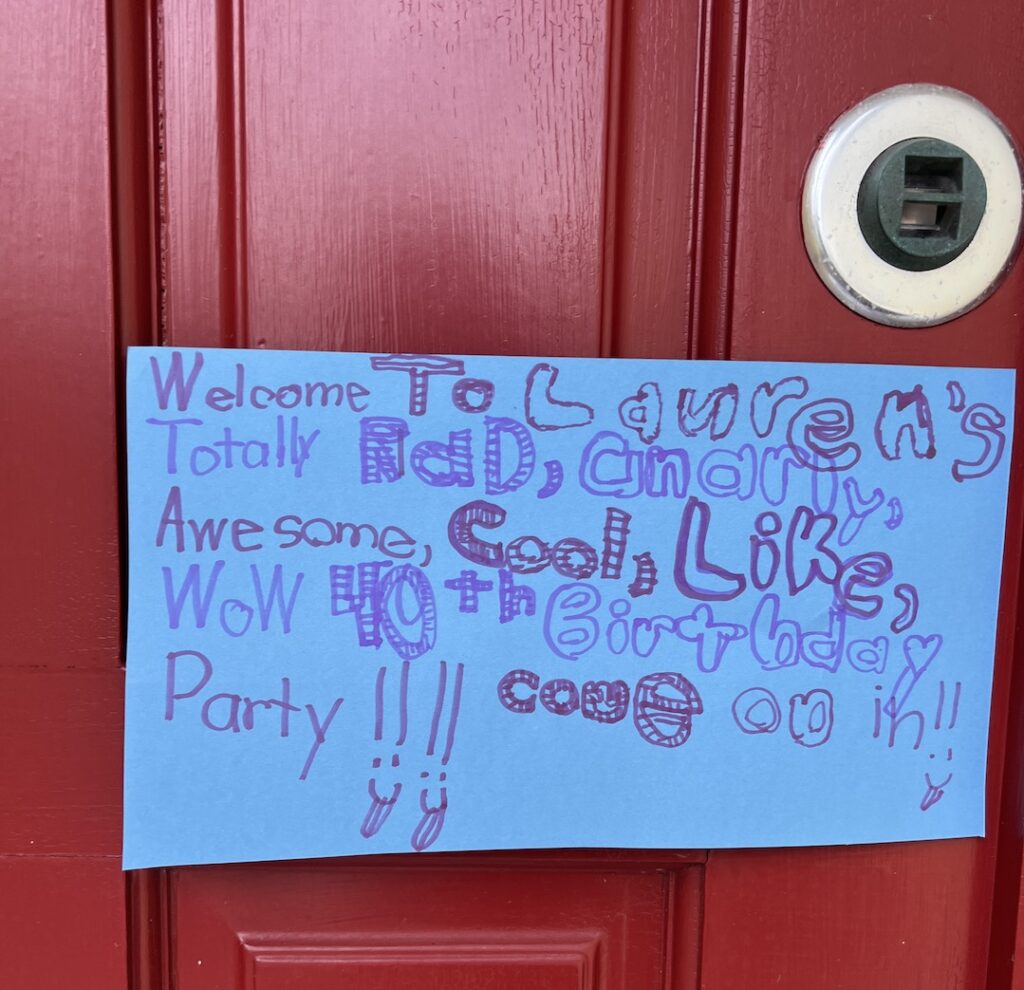 Front door sign at Lauren's 1980s Themed 40th Birthday Karaoke Party | Turns out that turning 40 can be totally tubular! Hop over to ThinkingCloset.com for the 411 on this bodacious birthday bash to remember!